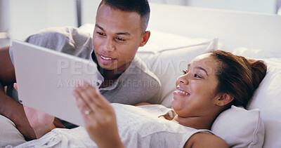 Buy stock photo Couple, happy and relax on bed with tablet, streaming subscription and social media memories in home. Man, woman smile and tech in bedroom for ecommerce, travel planning and choosing accommodation