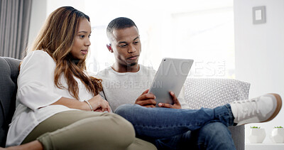 Buy stock photo Couple, reading or relax on sofa with tablet, streaming subscription or social media memories in home. Man, woman or technology in living room for ecommerce, travel planning or choosing accommodation