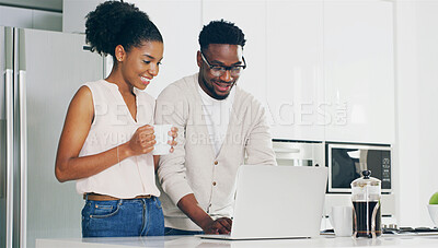 Buy stock photo Couple, laptop and coffee in kitchen with smile for support, work life balance and connection in home. African people, happy and planning in house for online shopping and ecommerce with budget review