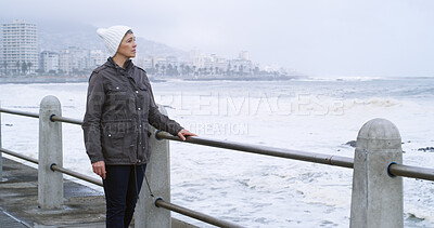 Buy stock photo Mature woman, thinking and outdoor by ocean with relax, planning and reflection for break on weekend. Female person, mental health and wellness by seaside or water for ideas, memory and mindfulness