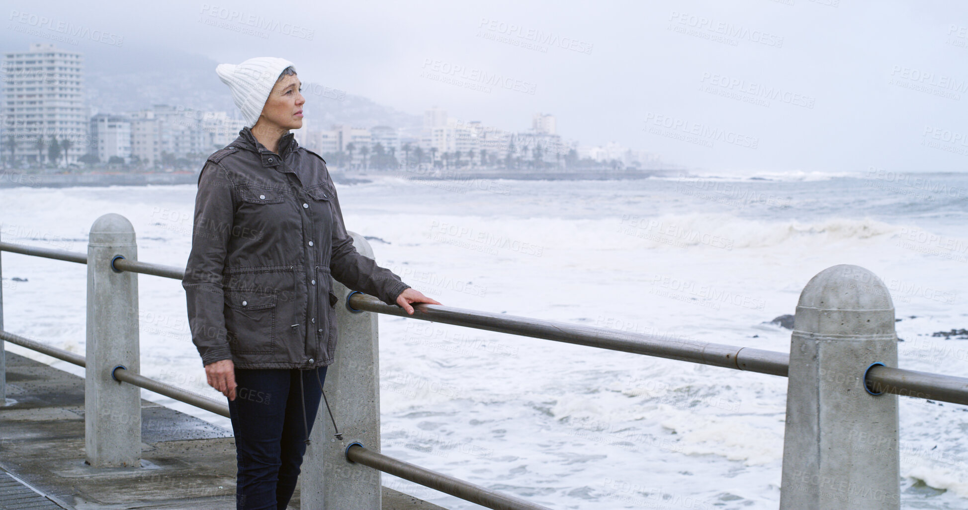 Buy stock photo Mature woman, thinking and outdoor by ocean with relax, planning and reflection for break on weekend. Female person, mental health and wellness by seaside or water for ideas, memory and mindfulness