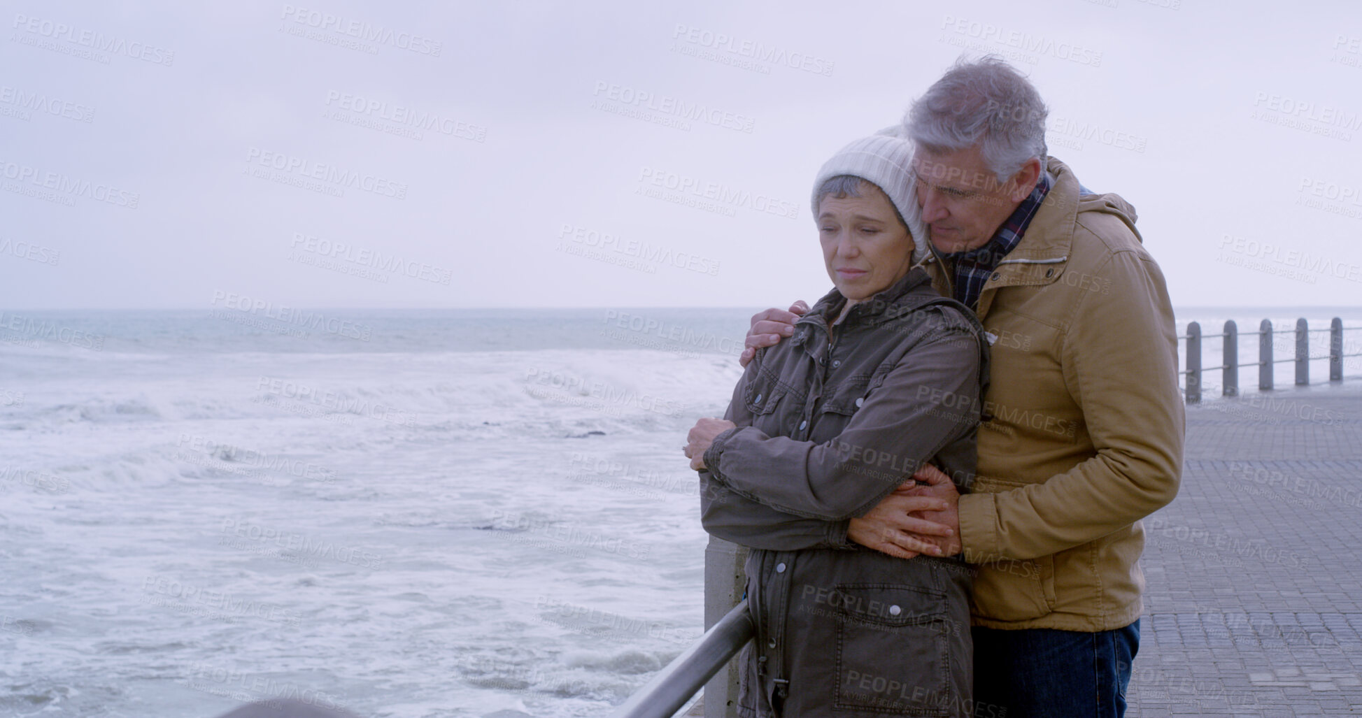 Buy stock photo Woman, man and embrace in relationship, outdoor or care with marriage, vacation or holiday on pier. Mature couple, hug and support by ocean, water and beach for love, partnership and bonding together