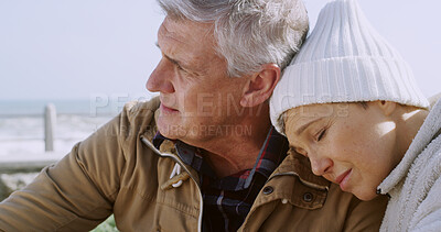 Buy stock photo Mature couple, love and thinking at ocean with depression, sadness and emotional support for loss. Mental health, senior people and empathy at seaside with trust, heartbreak and mourning bad news