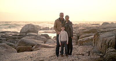 Buy stock photo Happy, ocean and portrait of grandparents with child for bonding, fun weekend and relax together at beach. Nature, family and boy, grandpa and grandma on holiday, adventure and vacation at sunrise