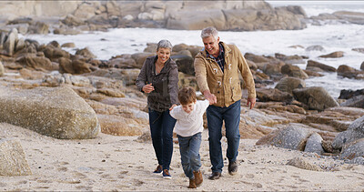 Buy stock photo Running, holding hands and grandparents with child at beach for bonding, fun weekend and relax together. Nature, family and young boy, grandpa and grandma playing on holiday, adventure and vacation