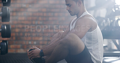 Buy stock photo Man, fitness or stretching with feet at gym for workout, exercise or indoor training. Male person, active or athlete with warm up for preparation or getting ready for wellness on floor at health club