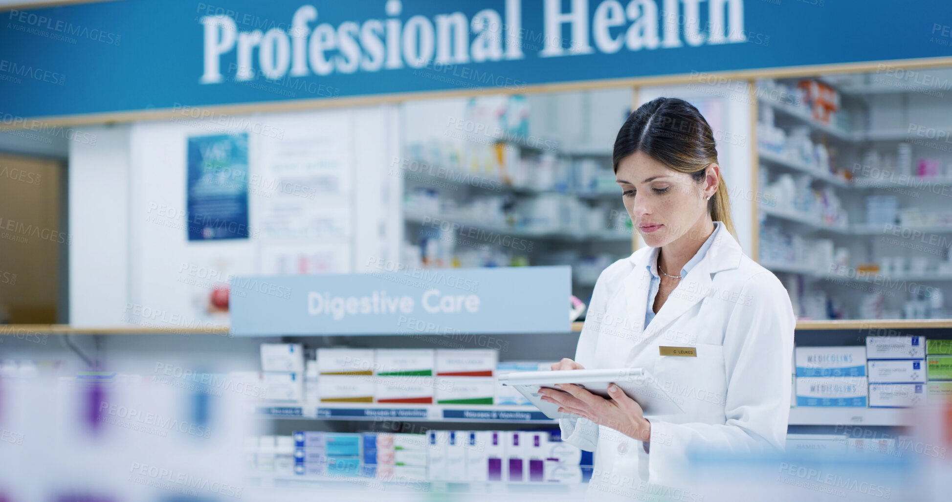 Buy stock photo Serious pharmacist, tablet and woman in drug store to check sales, medicine order and stock online. Pharmacy, medical professional and digital technology for healthcare, wellness email and telehealth