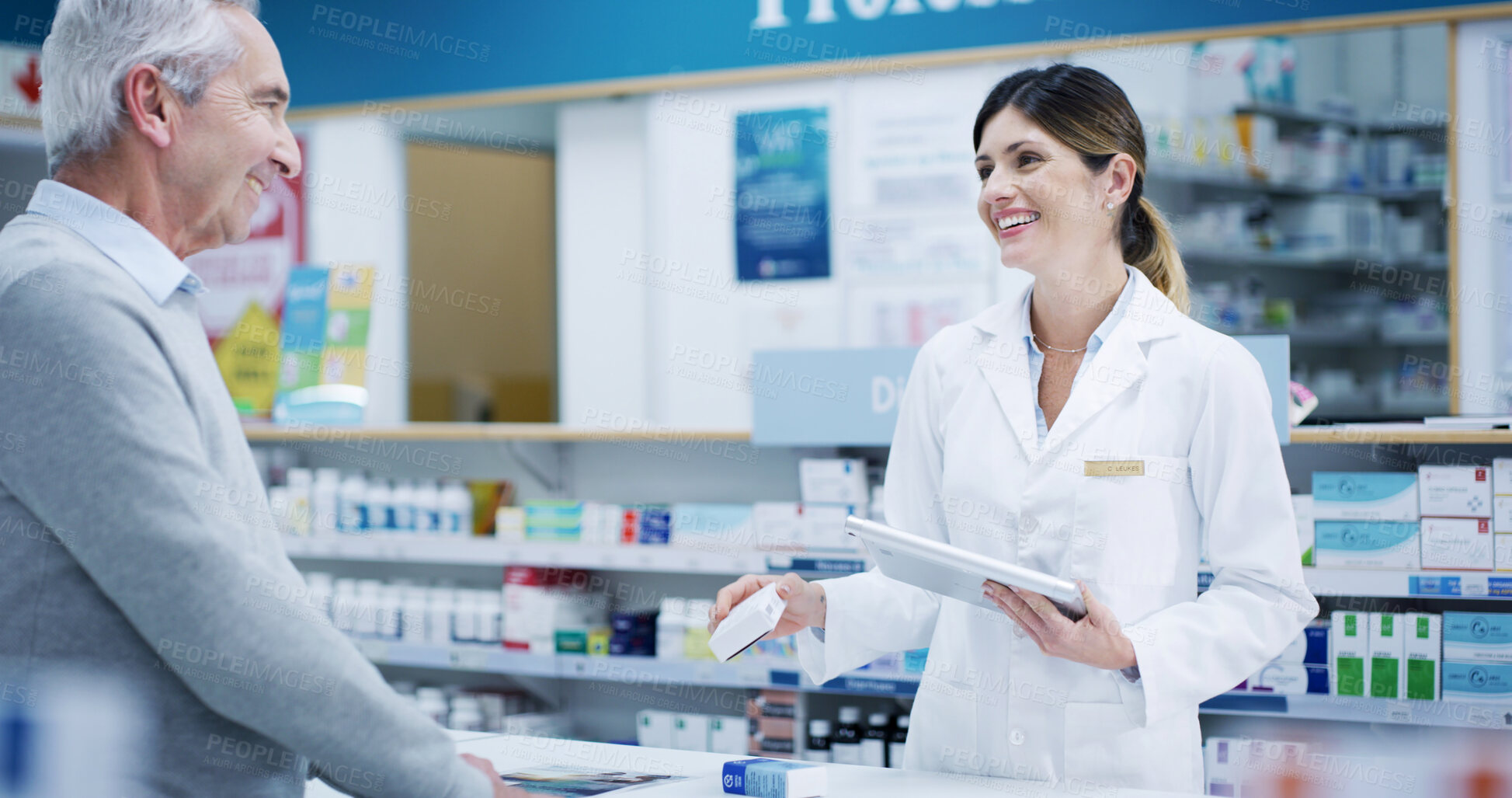 Buy stock photo Customer, tablet and happy pharmacist with medicine for help, cure or prescription drugs in retail drugstore. Medical pharmacy, senior man and woman with tech for consultation, healthcare and pills