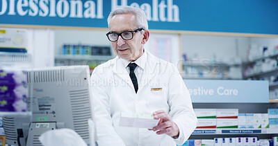 Buy stock photo Mature, pharmacist and man with drugs on computer for inventory check, online order and pills dispensary. Medical, professional and medication box in pharmacy store for pharmaceutical stock checklist