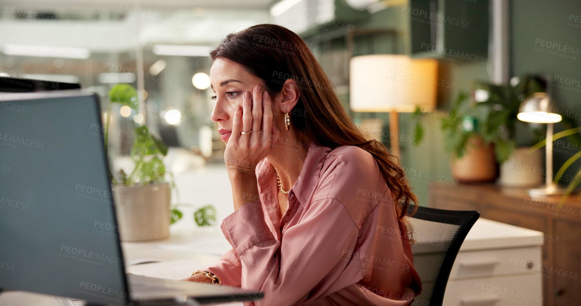 Buy stock photo Woman, tired and reading on computer for business, feedback and burnout in office. Mature entrepreneur, bored and tech in startup company with fatigue, connectivity and frustrated for problem solving