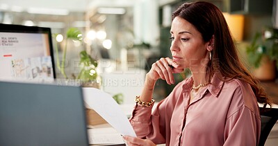 Buy stock photo Woman, paper or reading in office for business, budget management or proposal at computer. Mature entrepreneur, document or thinking in startup company for creative project with requirement checklist