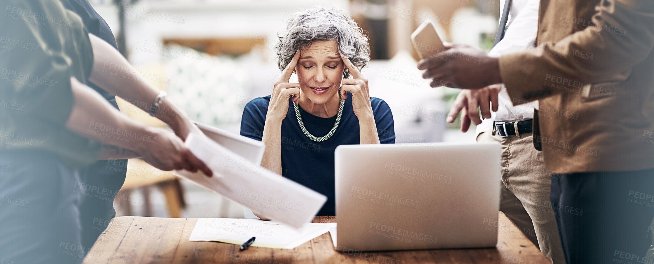 Buy stock photo Cropped shot of a stressed out businesswoman surrounded by colleagues needing help in an office