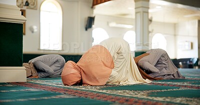 Buy stock photo Muslim, mosque or women bow in worship for Palestine, gratitude or support to Allah on holy carpet. Dua, community or Islamic people kneeling to God for trust and peace on Ramadan Kareem together