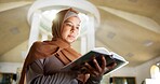 Muslim woman, reading and mosque with quran or holy book for recitation, praying or dua in temple. Female person, hijab or arab with islamic testament, scripture or word of god for faith or belief