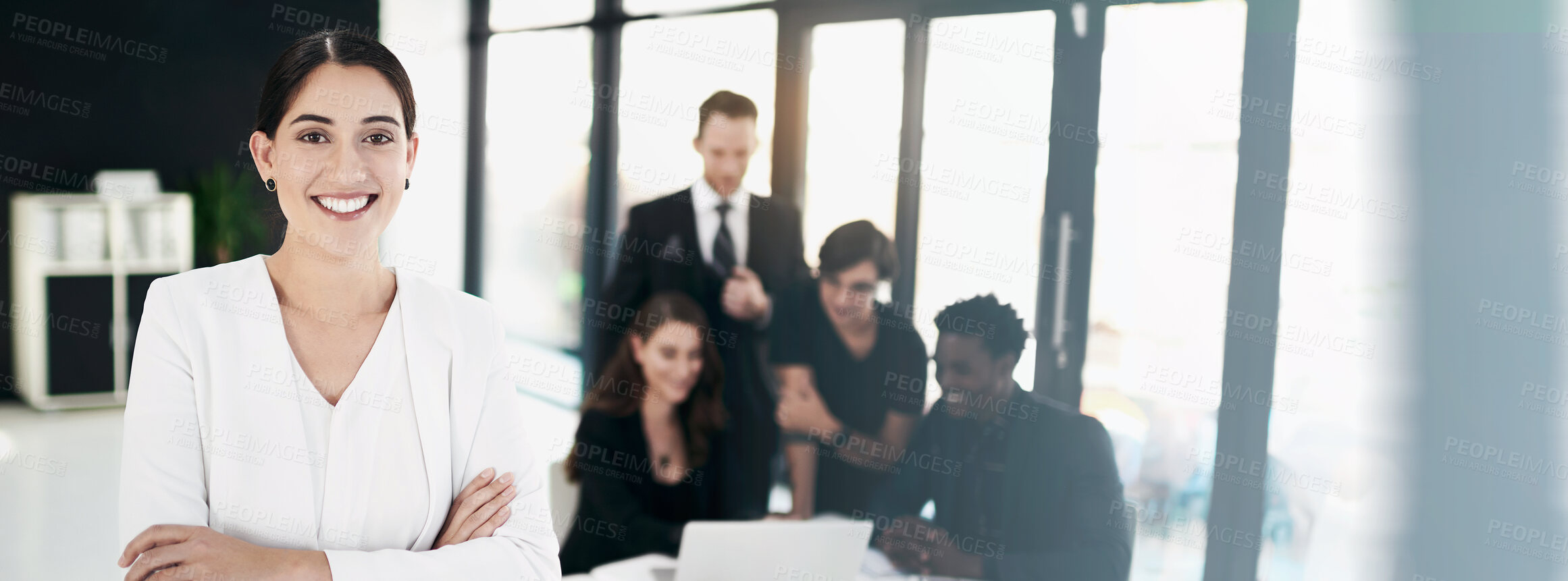 Buy stock photo Portrait of a businesswoman standing in a boardroom meeting with colleagues in the background