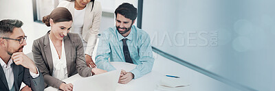 Buy stock photo Cropped shot of a group of businesspeople working together in a laptop in a modern office