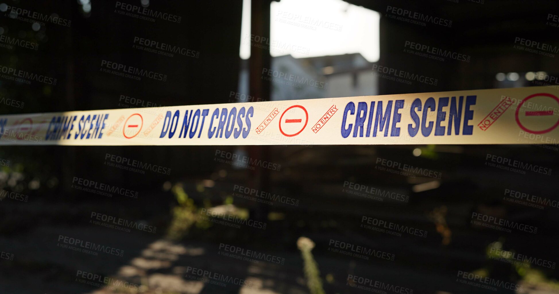 Buy stock photo Crime scene, police tape and warning in building for investigation with safety caution, danger or evidence. Forensic inspection, barrier sign and no entry in abandoned garage for emergency and search