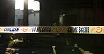 Crime scene, police tape and caution in building for investigation with safety warning, danger or evidence. Forensic inspection, barrier sign and no entry in abandoned garage for emergency and search