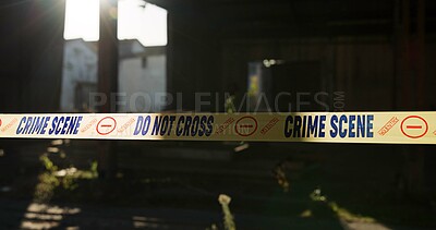 Buy stock photo Crime scene, police tape and caution in building for investigation with safety warning, danger or evidence. Forensic inspection, barrier sign and no entry in abandoned garage for emergency and search