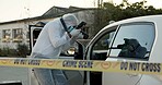 Detective, tape and crime scene of car evidence with photography, murder investigation and dna inspection. Forensic, hazmat and digital for blood proof, observation and documentation of accident case