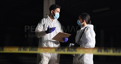 Buy stock photo Forensics team, discussion and crime scene investigation with clipboard, report or evidence at night. Investigators, man and woman with police outdoor for murder case, planning and clues for mystery