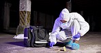 Person, swab and test at crime scene, blood sample and discovery of dna marker. Professional, homicide evidence and hazmat suit for safety, forensics expert and search for clues in investigation