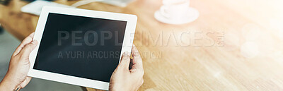 Buy stock photo Closeup shot of a person holding a digital tablet in a modern office