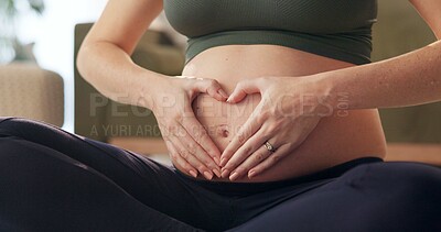 Buy stock photo Woman, healing and heart hands with pregnancy on yoga in home with health, love and wellness. Mother, care and balance to relax for pregnant mama with abdomen, pilates and healthy body on floor