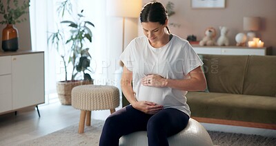 Buy stock photo Fitness, pilates and ball with pregnant woman in living room for health, exercise and peace. Yoga, maternity wellness and performance with person in lounge at home for pregnancy, self care and baby