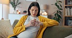 Coffee, relax and thinking with pregnant woman, sofa and living room of home for maternity leave wellness. Break, warm drink and mother blowing with glass, apartment and comfort for pregnancy or rest