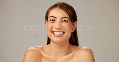 Buy stock photo Skincare, natural beauty and portrait of happy woman with glow, dermatology and shine on gray studio background. Face, smile and model with makeup, cosmetics and spa facial treatment for aesthetic