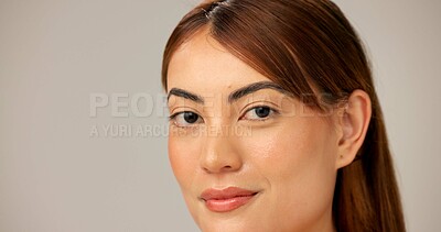 Buy stock photo Skincare, natural beauty and portrait of woman with glow, dermatology or shine closeup on gray studio background. Face, mockup space and model with makeup, cosmetics or pimple treatment for aesthetic