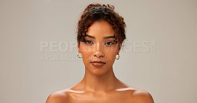 Buy stock photo Skincare, beauty portrait and woman with dermatology, glow and shine on gray studio background. Face, natural and confident African model with makeup, cosmetics and spa facial treatment for aesthetic