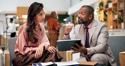 Buy stock photo Tablet, hotel lobby and business people with discussion, planning and meeting for conference or seminar. Man, woman and digital contract for b2b, partnership and work trip for hospitality and talk