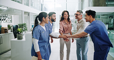 Buy stock photo Happy people, doctor or team with hand stack for motivation, collaboration or unity at hospital. Group, nurses or healthcare employees piling in solidarity with smile for meeting or mission at clinic