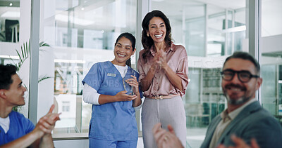 Buy stock photo Happy nurse, award and team with applause for congratulations, celebration or achievement at hospital. Excited, group or medical employees clapping for trophy, winning or accomplishment in boardroom