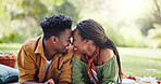 Love, touch and happy black couple at picnic in park for bonding, connection and outdoor adventure on weekend. Nature, man and woman on grass for date together with romantic embrace, smile and garden