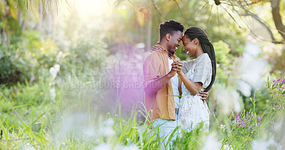 Buy stock photo Dance, holding hands and love with black couple in nature for romance, honeymoon and bonding together. Celebration, happiness and flowers with man and woman in park for relationship, support or care
