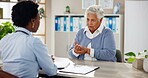 Consulting, talking and healthcare with old woman and doctor for insurance, results or diagnosis. Medical, helping and discussion with people in clinic for treatment plan, checkup and patient exam