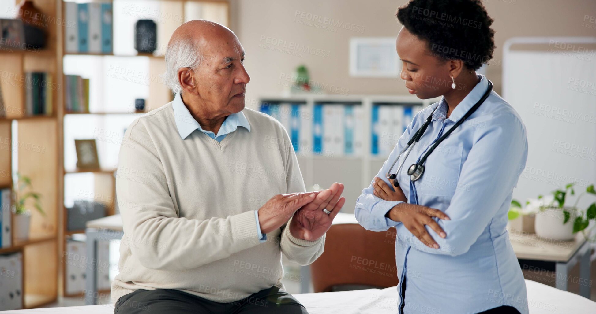 Buy stock photo Patient, doctor and explain with hand pain at office with arthritis symptoms, diagnosis and consultation. Woman, medical professional and senior man at clinic for assessment, healthcare and ache