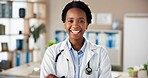 Black woman, doctor and happy in portrait at clinic with pride, confidence and services with healthcare. African medic, person and smile for career with wellness, excited and hospital in Nigeria