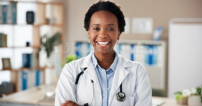 Buy stock photo Black woman, doctor and happy in portrait at clinic with pride, confidence and services with healthcare. African medic, person and smile for career with wellness, excited and hospital in Nigeria