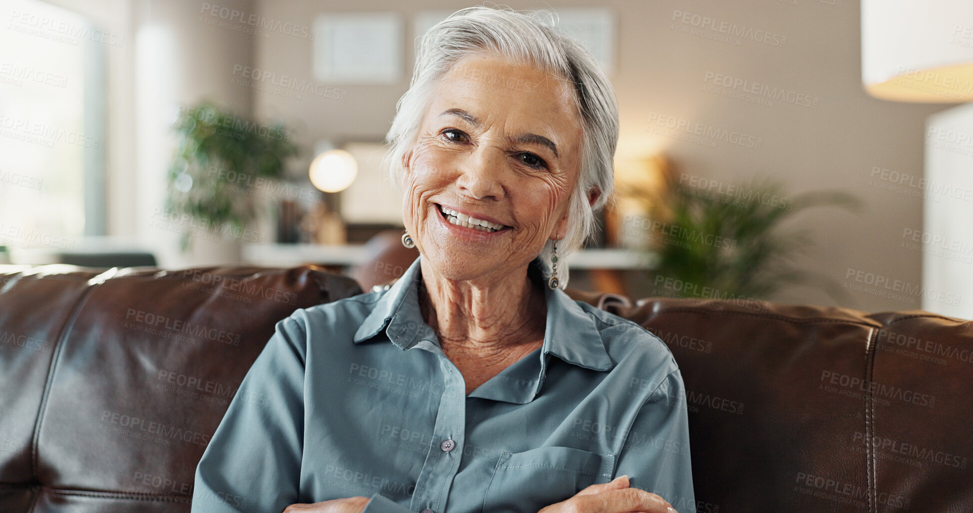 Buy stock photo Senior, woman and portrait with smile on sofa for relax, safety and security in retirement home. Wellness, elderly person and happy pensioner on couch in living room with comfort, peaceful and pride