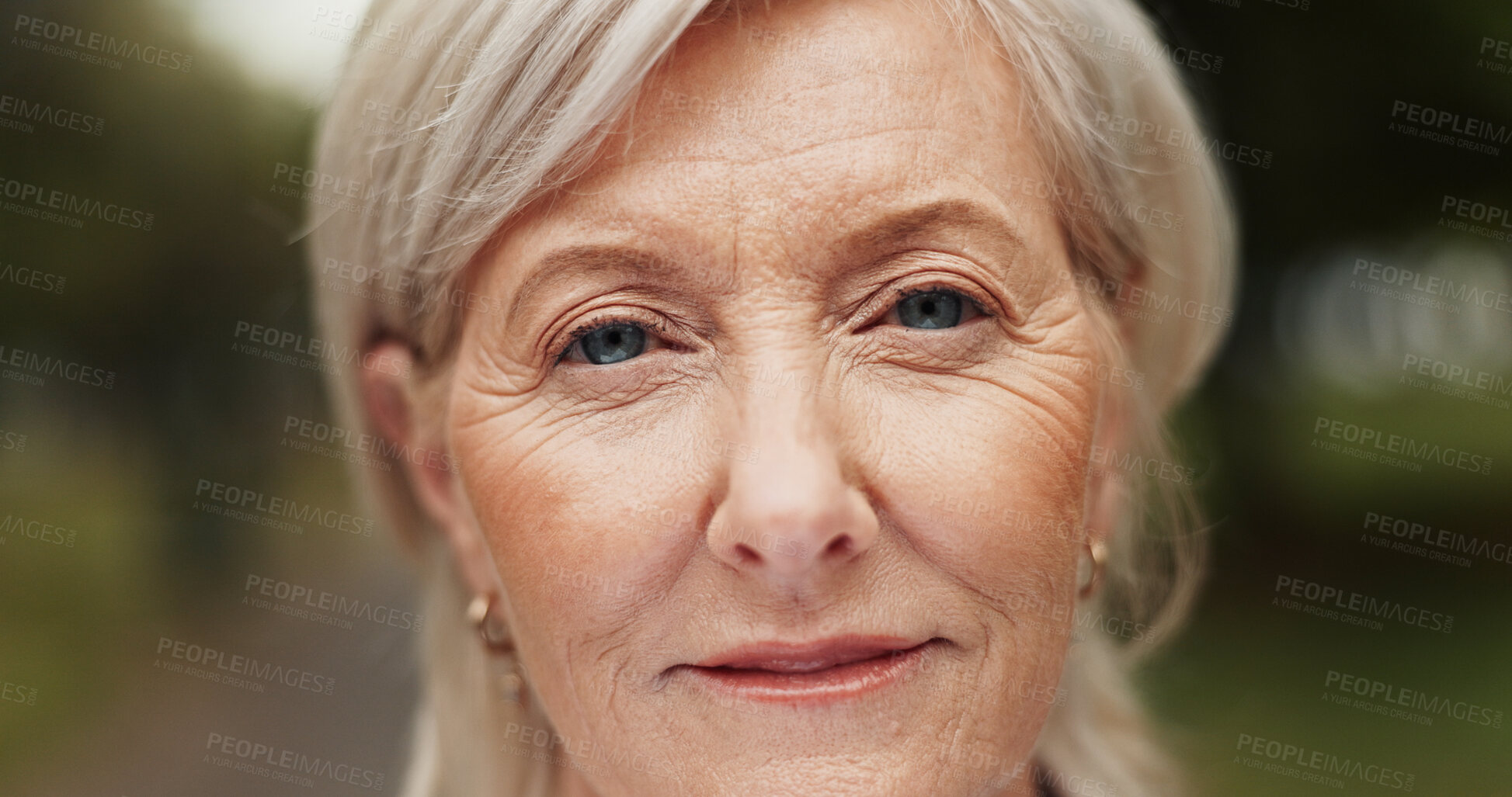 Buy stock photo Outdoor, mature woman and portrait with smile for wellness, wrinkles and anti aging with confidence. Closeup, female person and satisfied with contact lenses for eye care, wellbeing and face at zoom