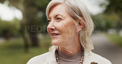 Buy stock photo Mature woman, thinking and outdoor for memory, reflection and nostalgia with happiness in park. Female person, smile and relax on break or rest in nature for calm, environment or fresh air on weekend