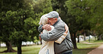 Elderly couple, happy and hug in park with love, affection and trust on healthy marriage. Senior people, excited and outdoor with embrace for connection, support and travel on vacation in Australia