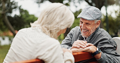 Buy stock photo Mature couple, laughing and smile in park for bonding, conversation and commitment together outdoors. Retirement, marriage and elderly man and women in nature on bench for love, care and connection