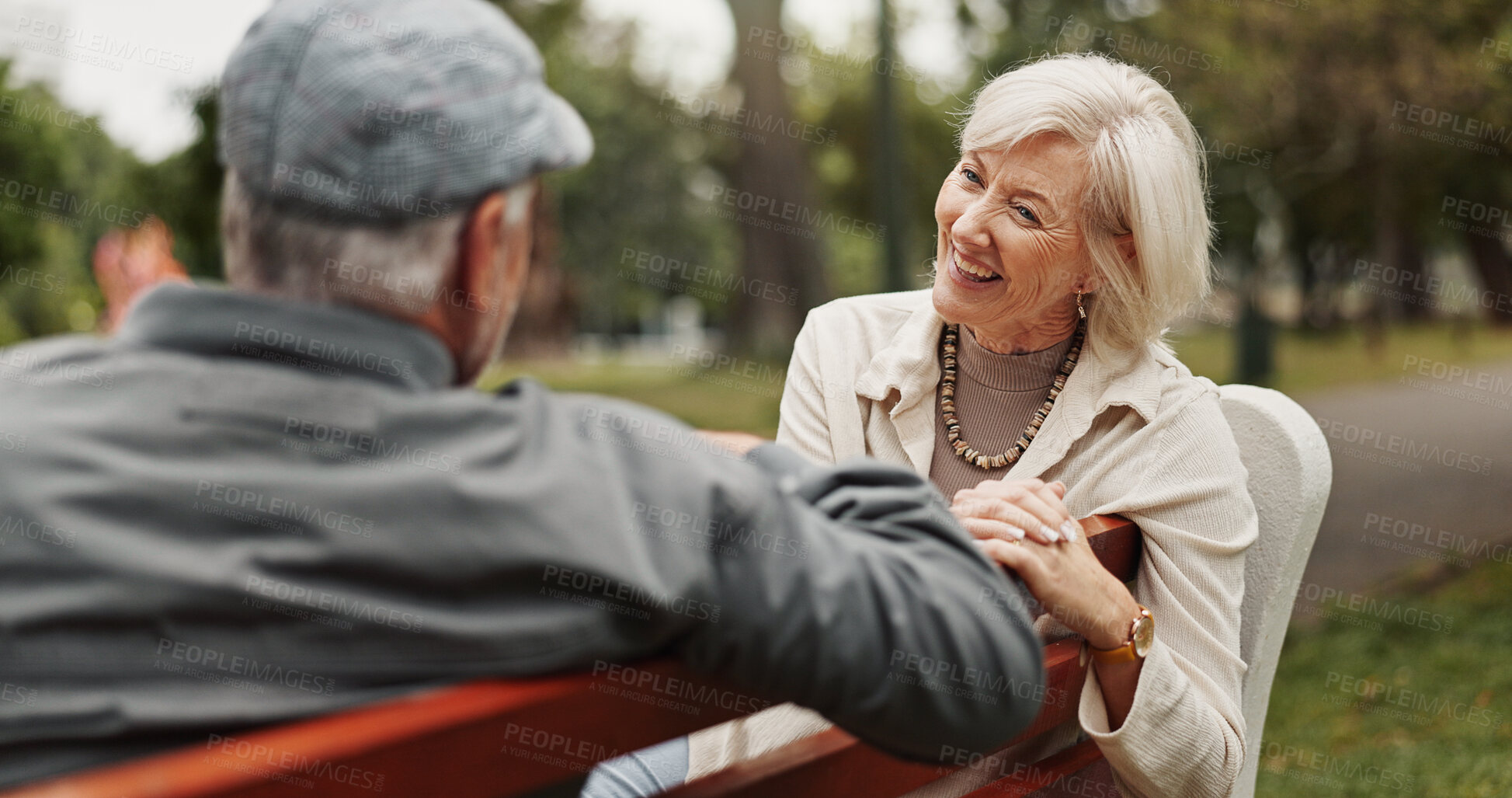 Buy stock photo Mature couple, laughing and outdoor in park for bonding, relationship or nostalgia with happiness. Woman, man and fun for relax, break and rest in nature for calm, environment or fresh air on weekend