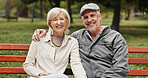 Senior couple, hug and portrait in park for bonding, conversation and commitment together outdoors. Retirement, marriage and mature man and women in nature on bench for love, care and connection
