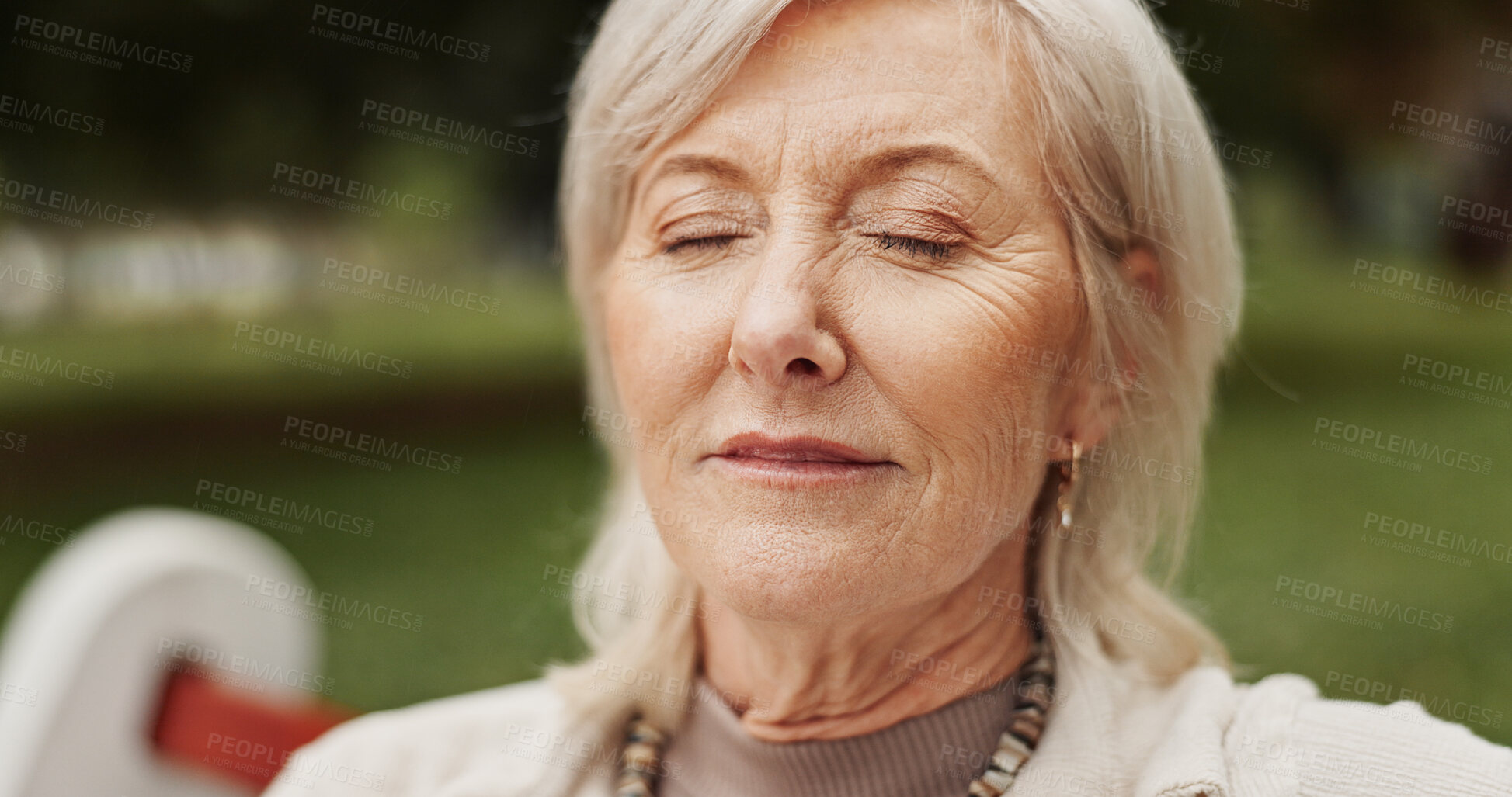 Buy stock photo Mature woman, peace and outdoor in park for memory, reflection and nostalgia with eyes closed. Female person, remember and zen on break or rest in nature for calm, environment or fresh air on weekend